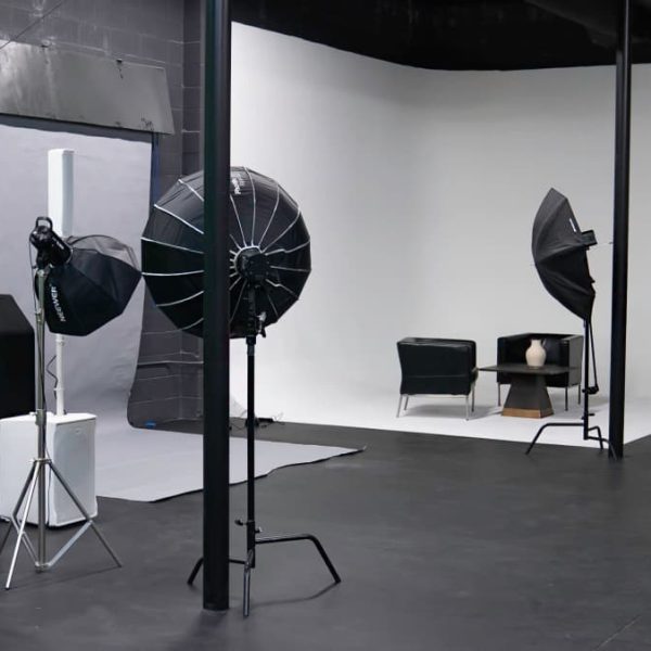 Softbox lights and a portrait backdrop in the VYRE Live photography studio
